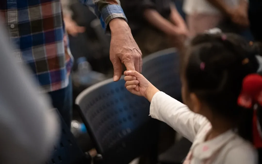 student getting support from trusted adult after bullying