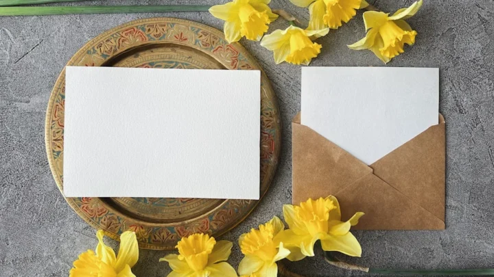 warm Easter gathering with spring flowers and greeting card