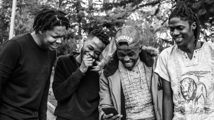 casual smartphone chat with playful laughter response