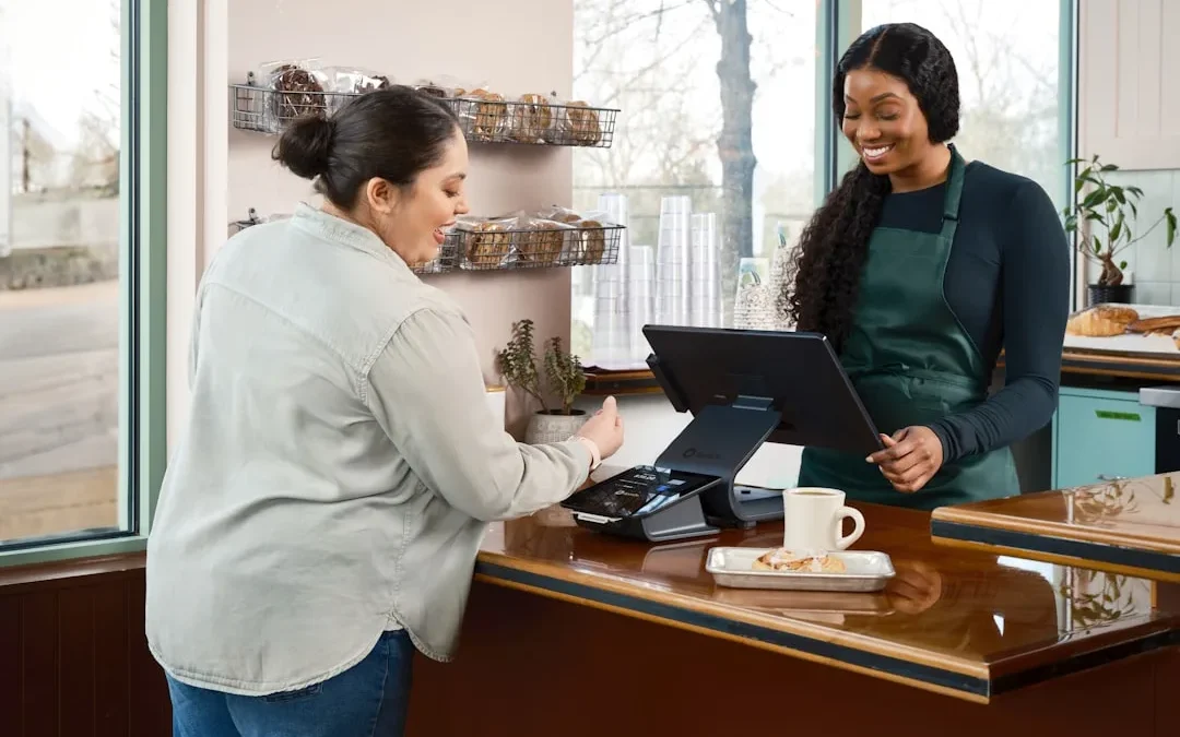 A calm service worker keeping composed while helping a frustrated customer