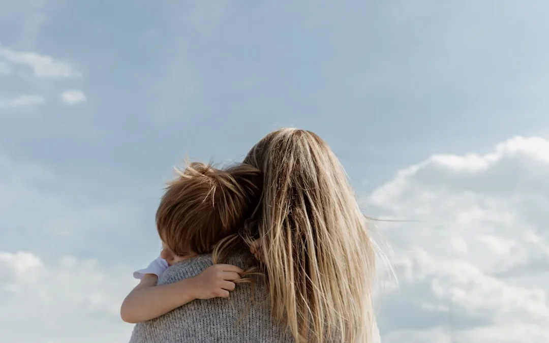 friend offering quiet compassionate support after parental loss