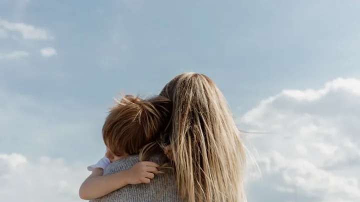friend offering quiet compassionate support after parental loss