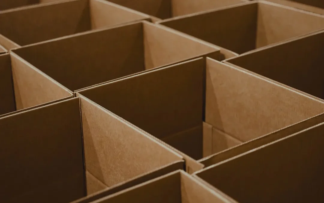 a lot of brown boxes that are open