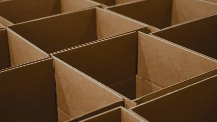 a lot of brown boxes that are open