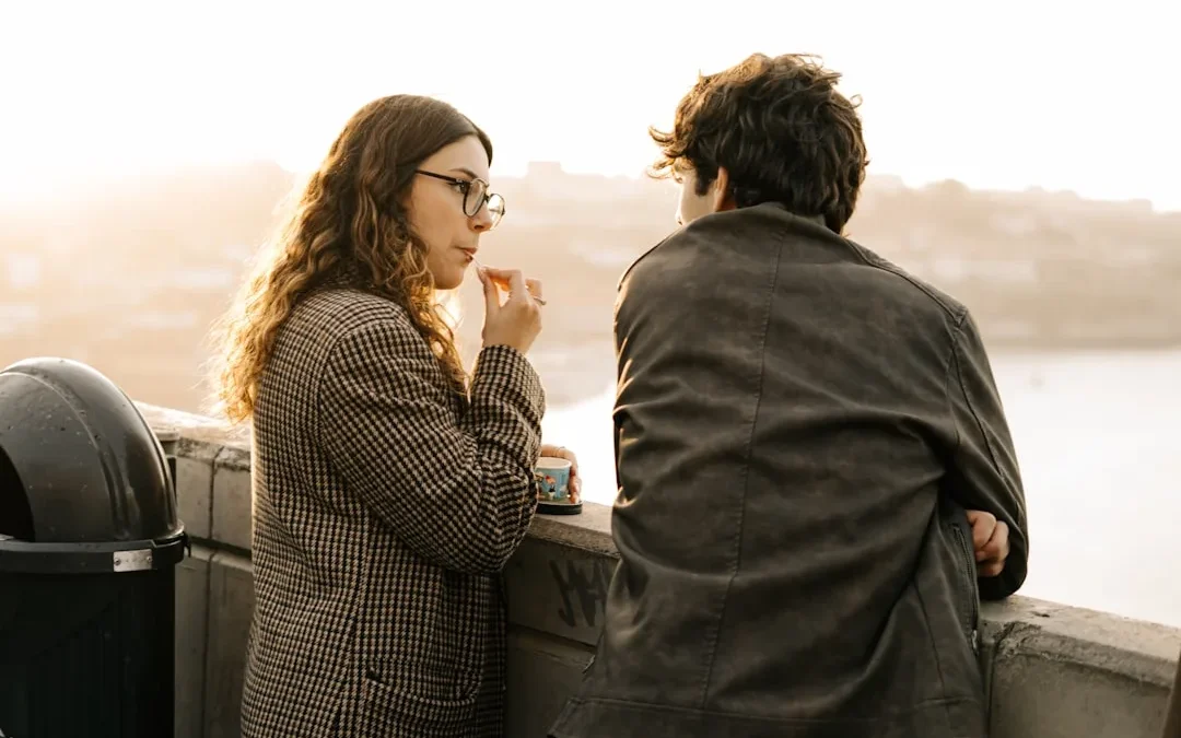 A man and a woman standing next to each other